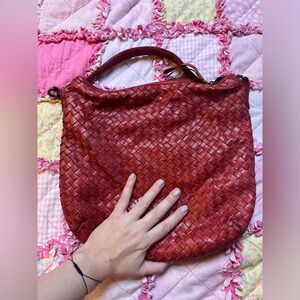 Woven leather bag with detachable shoulder and crossbody straps